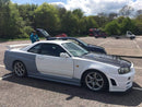 R34GTR OEM Style Side Skirts Pair & Cap.